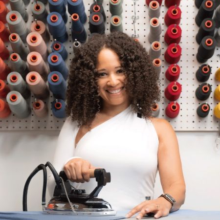 Kiya Tomlin née Winston working at her workshop.